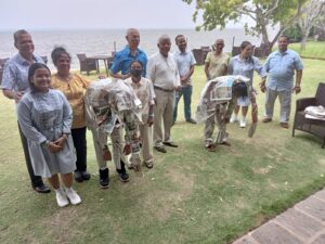Members distributing donated goods during an outdoor community outreach