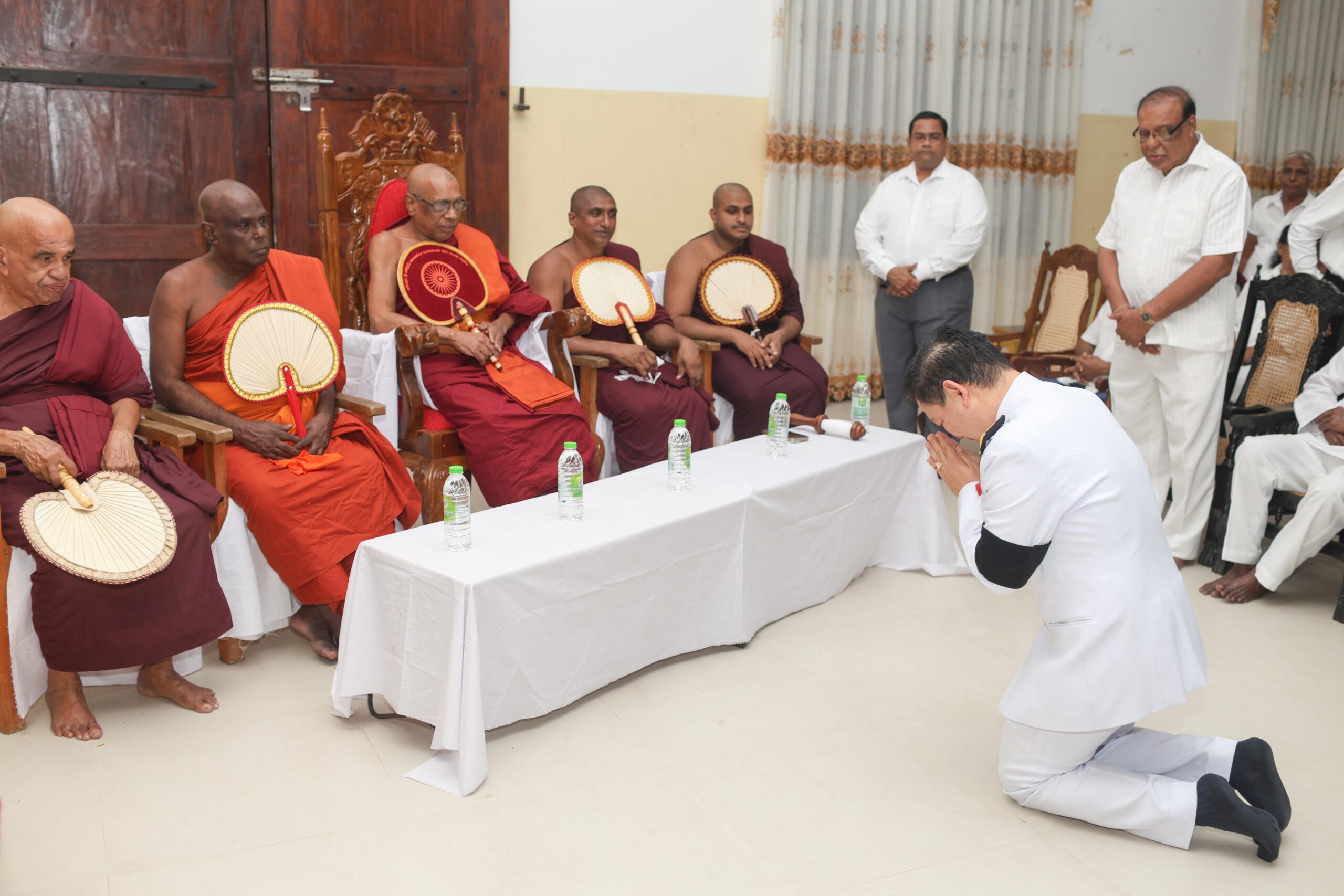 Thai delegation paying respect to Buddhist monks