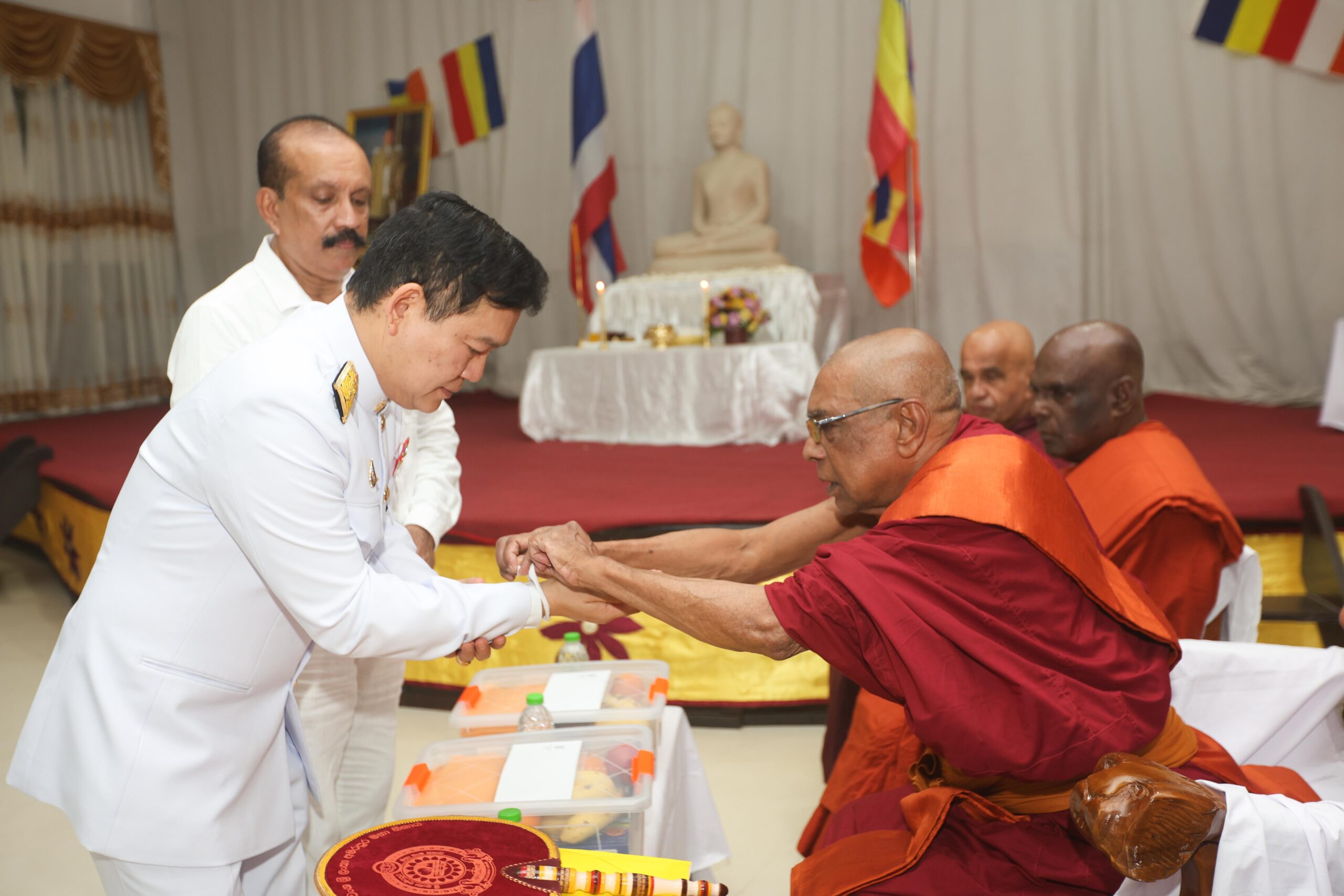 Ceremonial blessing by Buddhist monks
